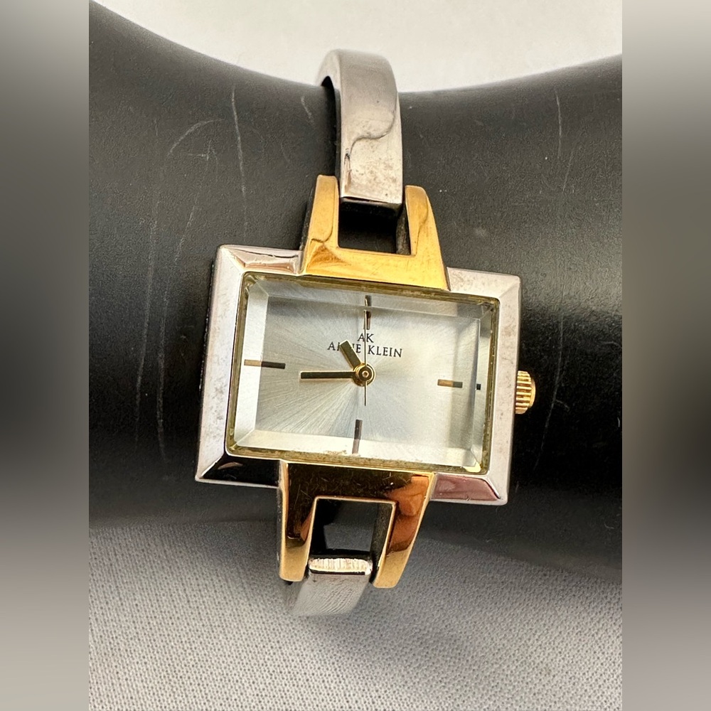 Anne Klein gold and silver tone rectangular shaped bracelet style watch